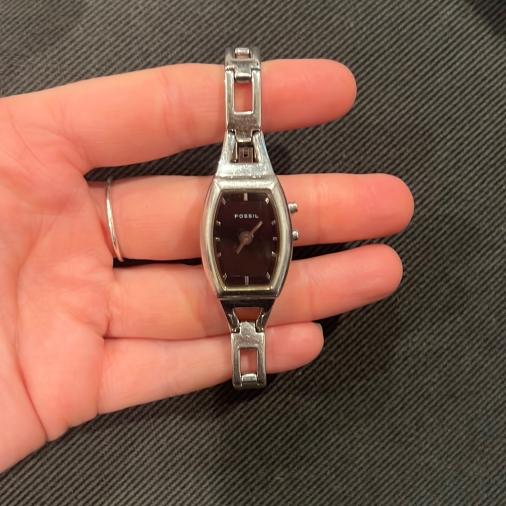 Women’s silver fossil watch.